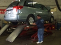 Professional repairing the car at the workshop