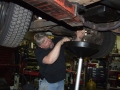 Mechanic repairing car at the workshop